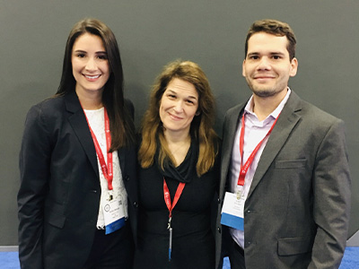 Dr. Sarah Glover, left, UMMC chief of digestive diseases; Dr. Anna H. Owings, UMMC internal medicine resident; and Landen S. Burstiner, research volunteer in digestive diseases at UMMC; each received awards for their poster presentations from the American College of Gastroenterology.